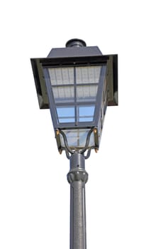 Street light with dual lanterns illuminating the night against a white backdrop.