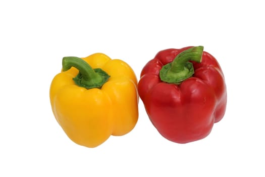 Yellow and red bell peppers on a white background, essential food ingredients.