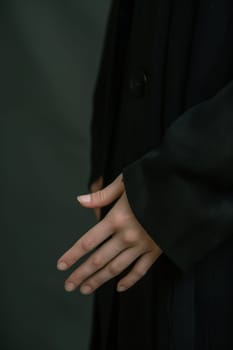 A close up of a woman's hand holding her cell phone