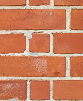 Orange, brick and wall texture with rough pattern, concrete background and masonry in architecture. Cracked, detail and building wallpaper with space for material, cement and construction design.