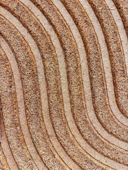 Texture close up of concentric circles on compressed coconut coir for natural fiber background. Natural background for design, websites or cards. High quality photo