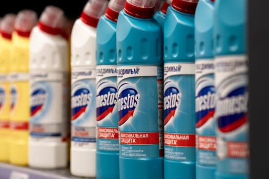 January 25, 2024, Kemerovo, Russia. Supermarket shelves are filled with a long row of bottles of Domestos. Disinfectant, toilet cleaner and disinfectants. Kills viruses.