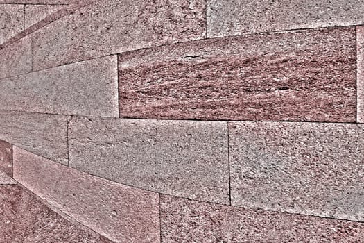 Texture of pinkish stone. The surface is rough and porous. Solid sandstone stone, pink stone, abstract background