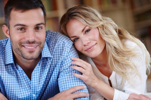 Portrait, home and hug with couple, relax and happiness with love or bonding together. People, apartment or man with woman in embrace with romance or relationship with marriage, care or trust.