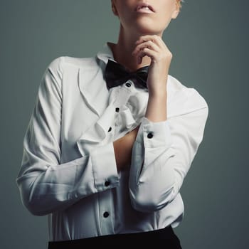 Woman, studio and elegant bowtie for fashion, grey background and isolated female person in waiter clothes for job. Trendy, designer shirt with copy space for stylish model, professional adult.