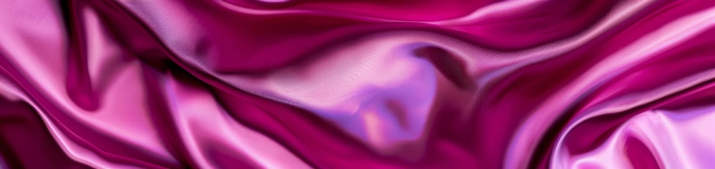 Sumptuous waves of magenta silk flow across the image, their glossy surface reflecting elegance and a tactile sensibility