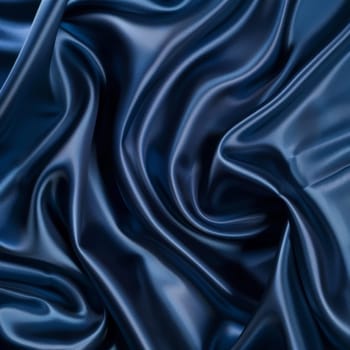 Dramatic folds and creases of lustrous blue silk create a captivating visual texture, with highlights and shadows adding depth and drama