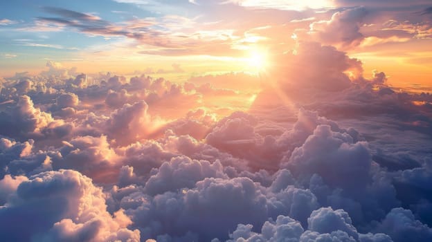 A view of a beautiful sunset over the clouds from above