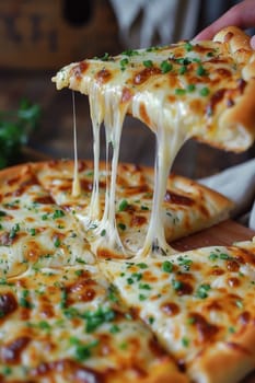 A person is holding a slice of cheese pizza with green sauce