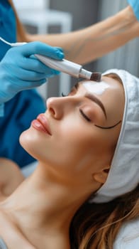 A woman getting a facial treatment at the beauty salon