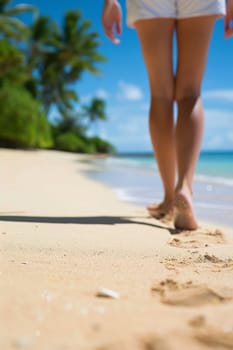 A woman walking on a beach with her feet in the sand