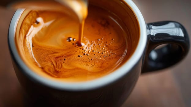 A close up of a cup with coffee being poured into it