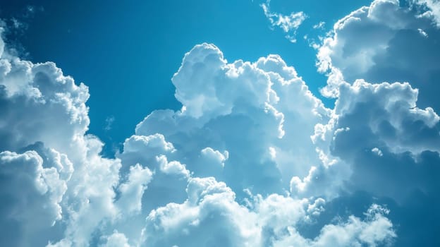 A plane flying through a blue sky with white clouds