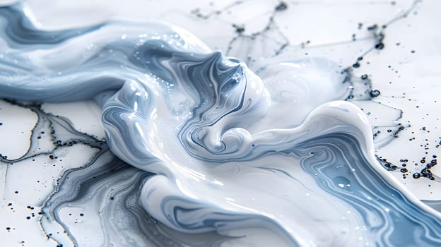 A close up of electric blue and white fluid, resembling a wind wave pattern on a white surface, reminiscent of art paint mixing or a water painting