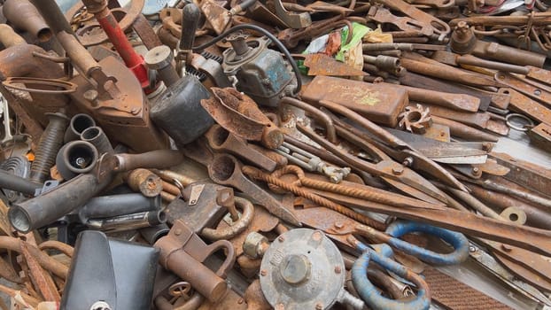 A flea market of old rusty things and tools