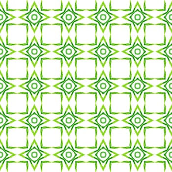 Textile ready stylish print, swimwear fabric, wallpaper, wrapping. Green exotic boho chic summer design. Ikat repeating swimwear design. Watercolor ikat repeating tile border.