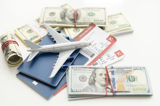 white plane on dollar cash closeup. High quality photo