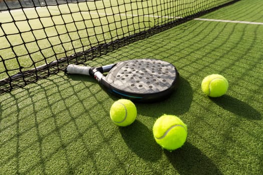 Paddle tennis racket and ball. High quality photo