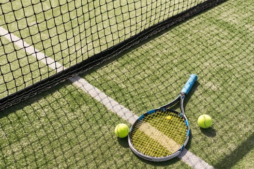 Tennis racket with a set of balls. High quality photo