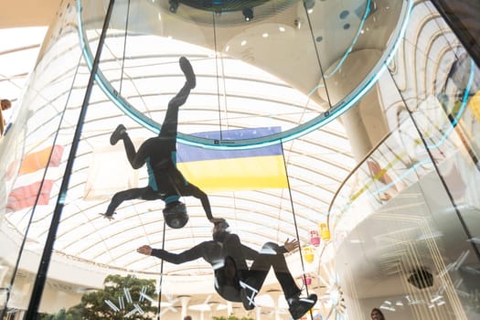 Vertical. Man controls the body in the air. Skydiving for active people. High quality photo