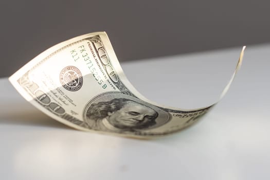 American dollars on a white background. High quality photo