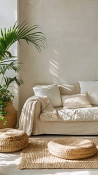 A living room with a couch, rug and potted plant