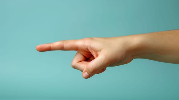 A hand pointing at something with a blue background