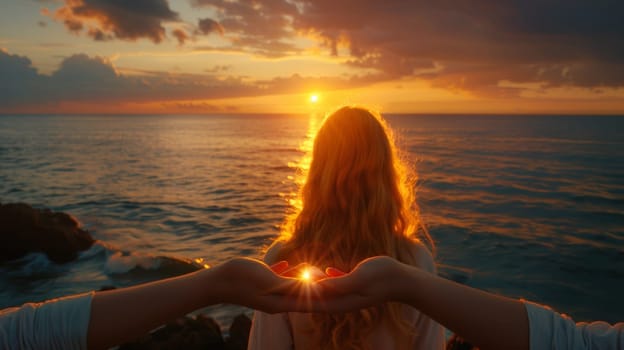 A woman holding hands with a sunset in the background