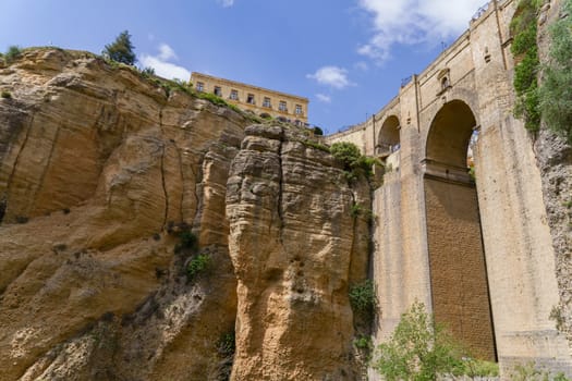 ronda ,malaga, spain 04/18/2023 bridge over a cliff linking the two parts of the city