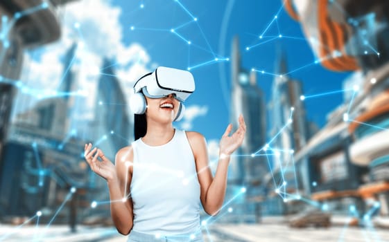 Female stand wear white VR headset and white sleeveless connect metaverse, future technology create cyberspace community. She look around and gesticulate enjoy fantasy building in meta. Hallucination.