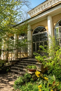 Odessa, Ukraine, 16.04.2024. Old historical building in Odessa Botanical Garden in Ukraine on a sunny spring day