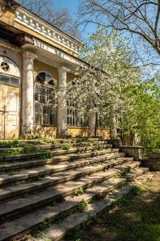Odessa, Ukraine, 16.04.2024. Old historical building in Odessa Botanical Garden in Ukraine on a sunny spring day
