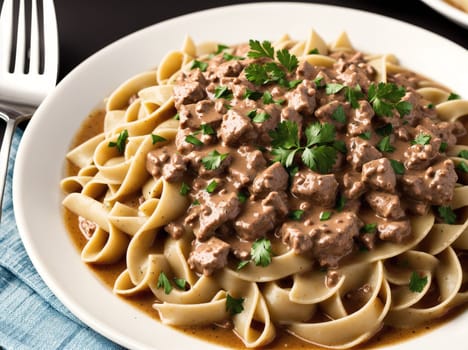 The image shows a plate of beef stroganoff with noodles, beef, and vegetables.