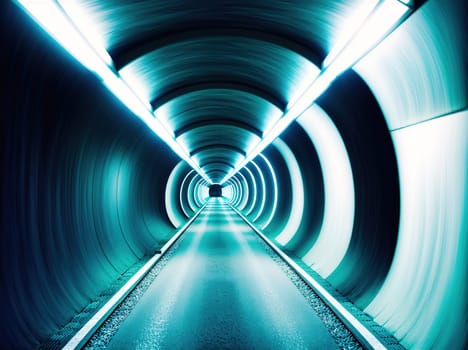 The image is a photograph of a long, dark tunnel with a bright light at the end.