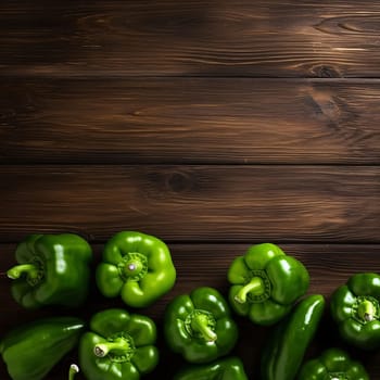 Banner: Green bell pepper on wooden background. Top view with copy space.