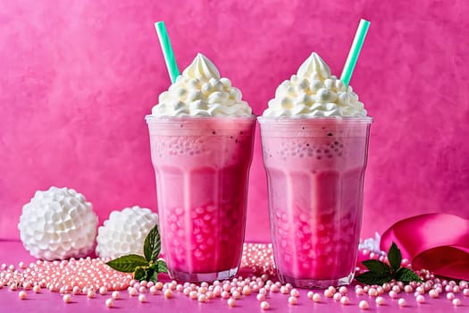 Festive setting with a vibrant pink bubble tea crowned with whipped cream and tapioca pearls