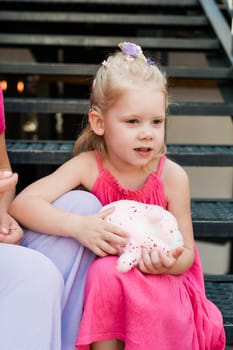 Child head with cochlear implant hearing aid. Hearing aid and medicine innovating technology and diversity concept