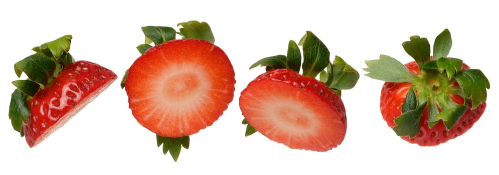 Various pieces of ripe red strawberries on isolated background, close up