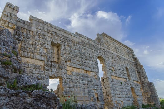 Ruins of the Roman theatre of the archaeological site of the ancient city of Acinipo in the Serrania de Ronda, Malaga, Spain