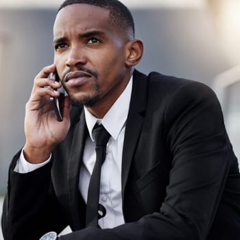 Businessman, serious and phone call on city steps for networking or business travel plans and communication. Male employee, smartphone and corporate conversation on company feedback or sales review