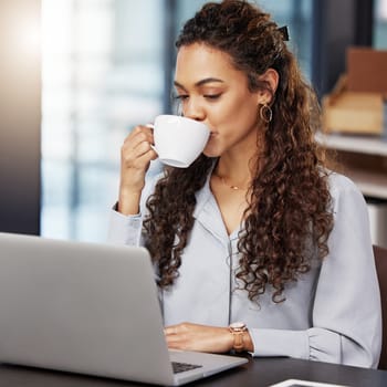 Drink, coffee and woman with laptop at desk for research report, website and feedback on article. Writer, idea and journalist with technology in office for online news, review and beverage at work.