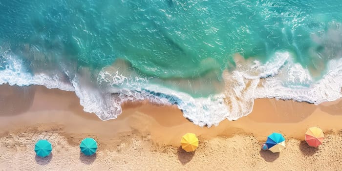 A beach scene with a row of umbrellas and a body of water. The umbrellas are yellow and blue, and they are arranged in a row