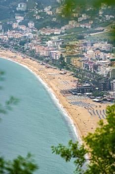 View of Cleopatra beach in Alanya, one of the touristic districts of Antalya, from Alanya Castle