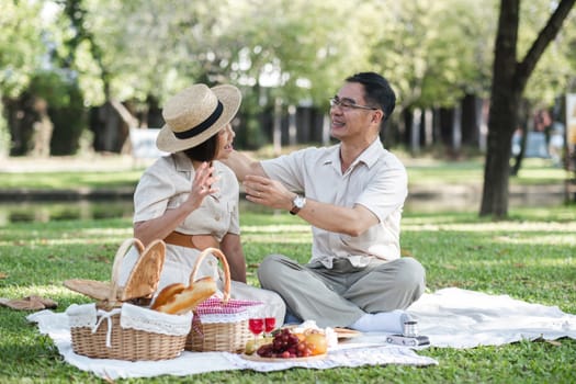 warm family There are parents and children doing picnic activities and relaxing outside together at the park on holidays..