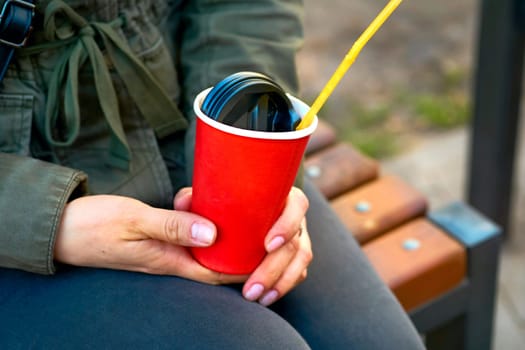 a small bowl shaped container for drinking from, typically having a handle