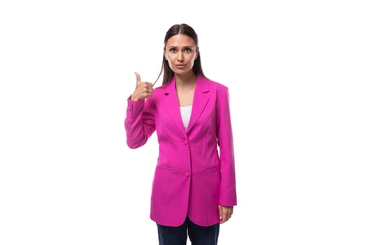 young successful slim brunette secretary woman wearing a lilac jacket on a white background.