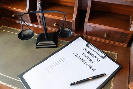 Personal Injury Claim Form on a Lawyer's Desk
