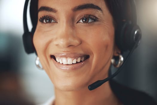 Call center, smile and vision with woman consultant in telemarketing office for help or sales. Contact us, face and headset with happy person in workplace for consulting, customer service or support.