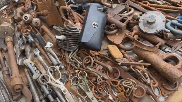 A flea market of old rusty things and tools