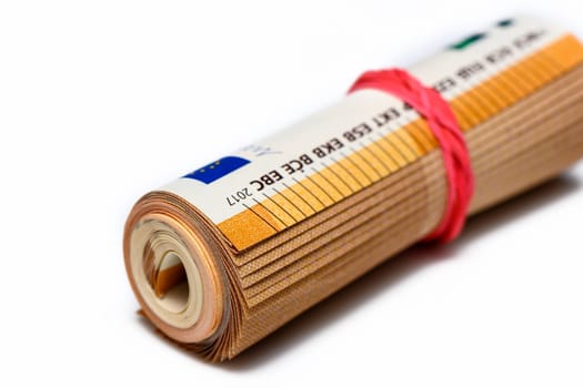 Close-up of a bundle of fifty euro bank notes bound with rubber band 1